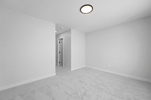 111 Fireside Street, Cochrane, AB - Indoor Photo Showing Other Room
