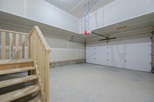 111 Fireside Street, Cochrane, AB - Indoor Photo Showing Garage