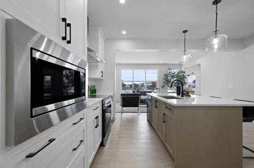 111 Fireside Street, Cochrane, AB - Indoor Photo Showing Kitchen With Double Sink With Upgraded Kitchen