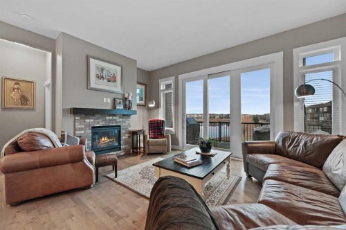 76 Legacy Circle Se, Calgary, AB - Indoor Photo Showing Living Room With Fireplace