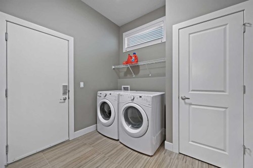 76 Legacy Circle Se, Calgary, AB - Indoor Photo Showing Laundry Room