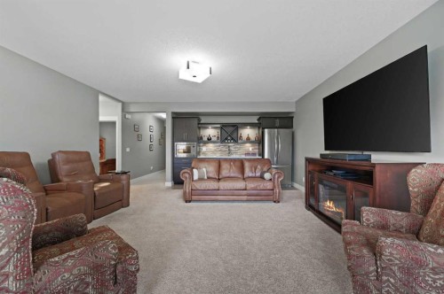 76 Legacy Circle Se, Calgary, AB - Indoor Photo Showing Living Room With Fireplace