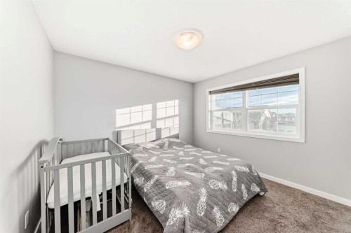 1810 Baywater Drive Sw, Airdrie, AB - Indoor Photo Showing Bedroom