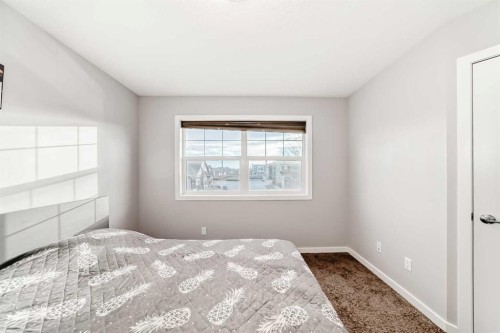1810 Baywater Drive Sw, Airdrie, AB - Indoor Photo Showing Bedroom