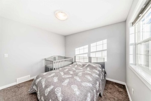1810 Baywater Drive Sw, Airdrie, AB - Indoor Photo Showing Bedroom
