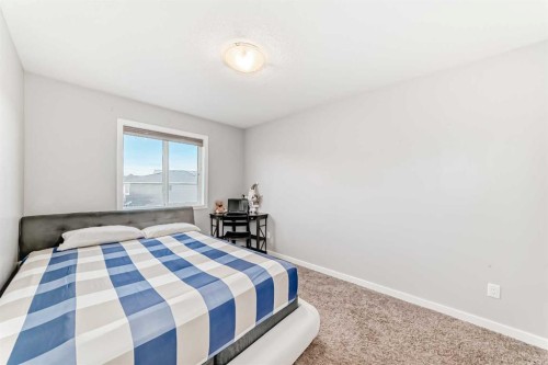 1810 Baywater Drive Sw, Airdrie, AB - Indoor Photo Showing Bedroom