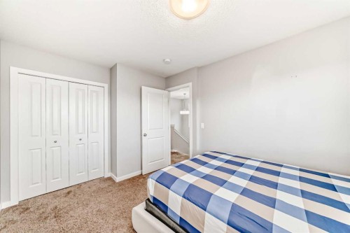 1810 Baywater Drive Sw, Airdrie, AB - Indoor Photo Showing Bedroom