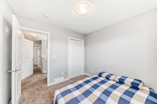 1810 Baywater Drive Sw, Airdrie, AB - Indoor Photo Showing Bedroom