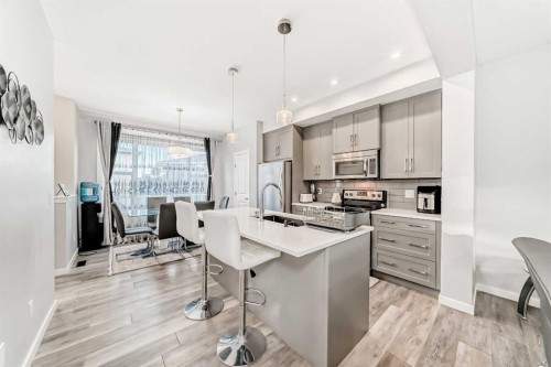 1810 Baywater Drive Sw, Airdrie, AB - Indoor Photo Showing Kitchen With Stainless Steel Kitchen With Upgraded Kitchen