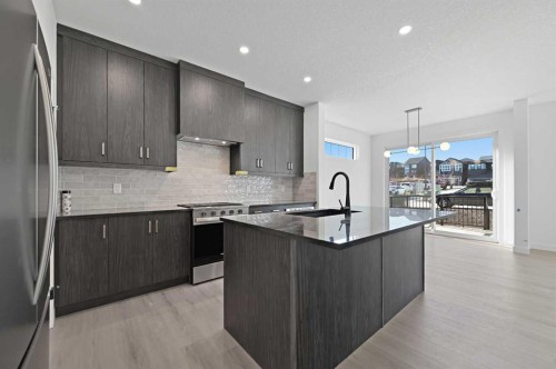 264 Edith Place Nw, Calgary, AB - Indoor Photo Showing Kitchen With Upgraded Kitchen
