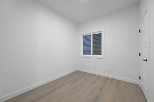 264 Edith Place Nw, Calgary, AB - Indoor Photo Showing Other Room