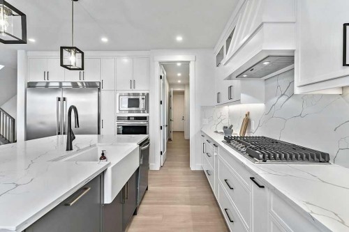 29 North Bridges Landing, Langdon, AB - Indoor Photo Showing Kitchen With Upgraded Kitchen