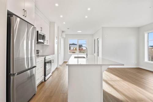 2202-2117 81 Street Sw, Calgary, AB - Indoor Photo Showing Kitchen With Stainless Steel Kitchen With Upgraded Kitchen