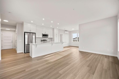 2202-2117 81 Street Sw, Calgary, AB - Indoor Photo Showing Kitchen With Stainless Steel Kitchen With Upgraded Kitchen