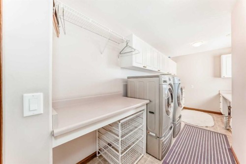 67 Evergreen Rise Sw, Calgary, AB - Indoor Photo Showing Laundry Room