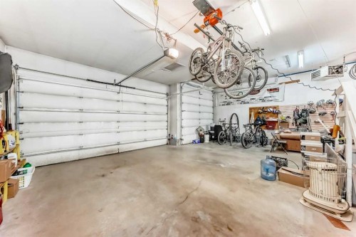 67 Evergreen Rise Sw, Calgary, AB - Indoor Photo Showing Garage