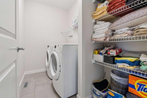 71 Mount Rae Heights, Okotoks, AB - Indoor Photo Showing Laundry Room