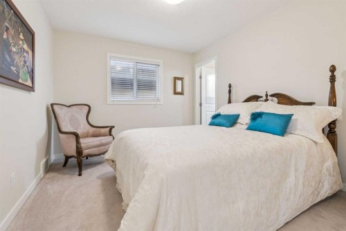 71 Mount Rae Heights, Okotoks, AB - Indoor Photo Showing Bedroom