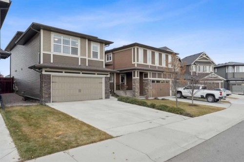 71 Mount Rae Heights, Okotoks, AB - Outdoor With Facade