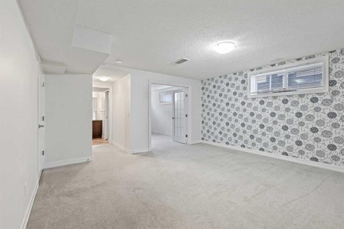 148 Copperpond Boulevard Se, Calgary, AB - Indoor Photo Showing Other Room