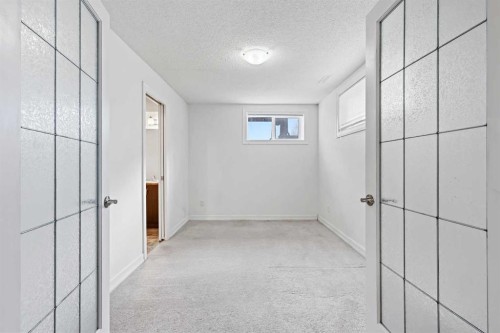 148 Copperpond Boulevard Se, Calgary, AB - Indoor Photo Showing Other Room