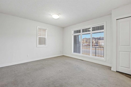 148 Copperpond Boulevard Se, Calgary, AB - Indoor Photo Showing Other Room