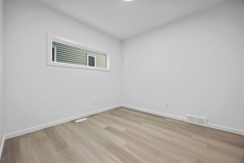 2321 Lancaster Heights Se, Airdrie, AB - Indoor Photo Showing Other Room