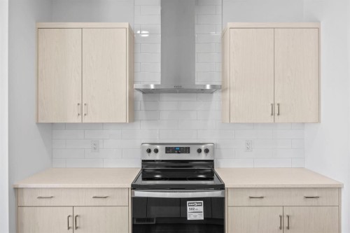 2321 Lancaster Heights Se, Airdrie, AB - Indoor Photo Showing Kitchen