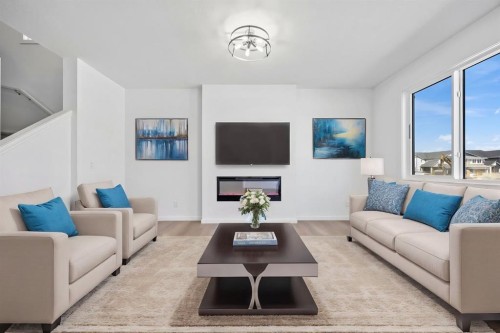 2321 Lancaster Heights Se, Airdrie, AB - Indoor Photo Showing Living Room
