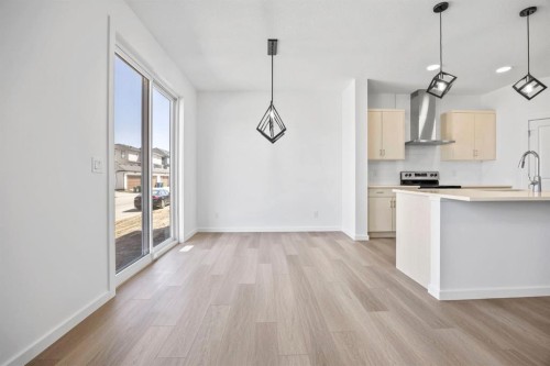 2321 Lancaster Heights Se, Airdrie, AB - Indoor Photo Showing Kitchen With Upgraded Kitchen