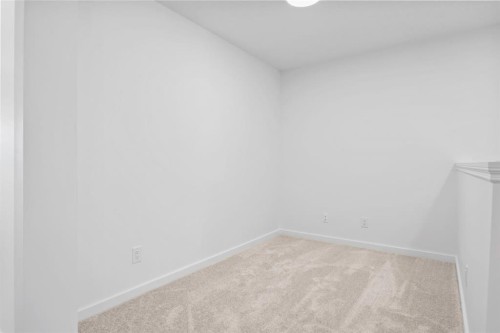2321 Lancaster Heights Se, Airdrie, AB - Indoor Photo Showing Other Room