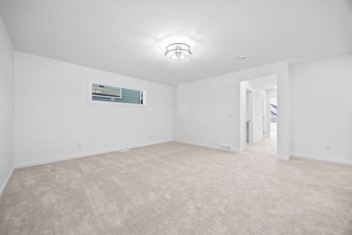 2321 Lancaster Heights Se, Airdrie, AB - Indoor Photo Showing Other Room