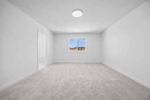 2321 Lancaster Heights Se, Airdrie, AB - Indoor Photo Showing Other Room