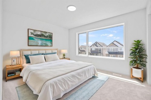 2321 Lancaster Heights Se, Airdrie, AB - Indoor Photo Showing Bedroom
