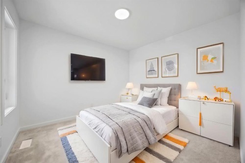 2321 Lancaster Heights Se, Airdrie, AB - Indoor Photo Showing Bedroom