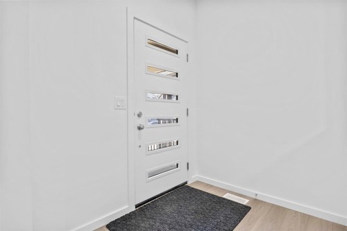 2321 Lancaster Heights Se, Airdrie, AB - Indoor Photo Showing Other Room