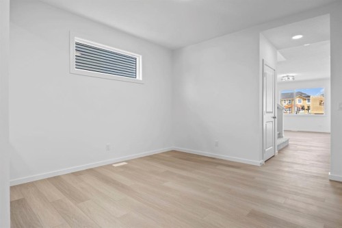 2321 Lancaster Heights Se, Airdrie, AB - Indoor Photo Showing Other Room