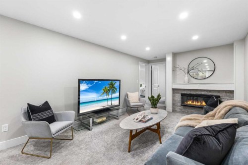 860 Archwood Road Se, Calgary, AB - Indoor Photo Showing Other Room With Fireplace