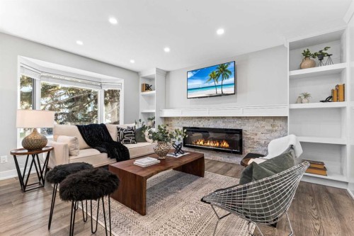 860 Archwood Road Se, Calgary, AB - Indoor Photo Showing Living Room With Fireplace