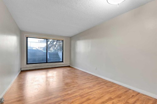 102-611 67 Avenue Sw, Calgary, AB - Indoor Photo Showing Other Room