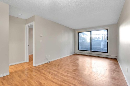 102-611 67 Avenue Sw, Calgary, AB - Indoor Photo Showing Other Room