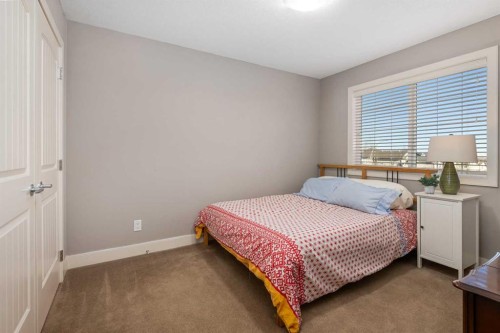 301 Westmount Court, Okotoks, AB - Indoor Photo Showing Bedroom
