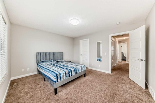 167 Cornerstone Passage Ne, Calgary, AB - Indoor Photo Showing Bedroom