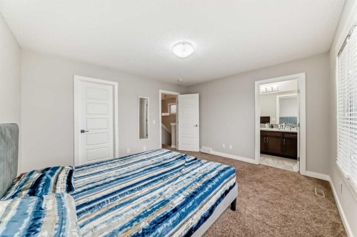 167 Cornerstone Passage Ne, Calgary, AB - Indoor Photo Showing Bedroom