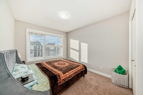 167 Cornerstone Passage Ne, Calgary, AB - Indoor Photo Showing Bedroom