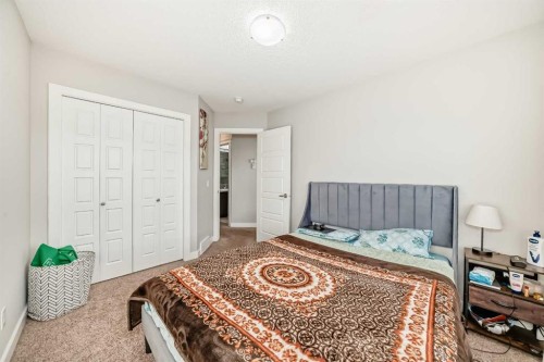 167 Cornerstone Passage Ne, Calgary, AB - Indoor Photo Showing Bedroom