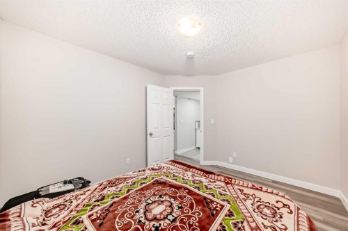 167 Cornerstone Passage Ne, Calgary, AB - Indoor Photo Showing Bedroom