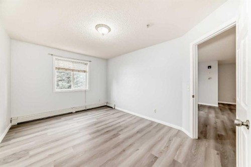 311-290 Shawville Way Se, Calgary, AB - Indoor Photo Showing Other Room