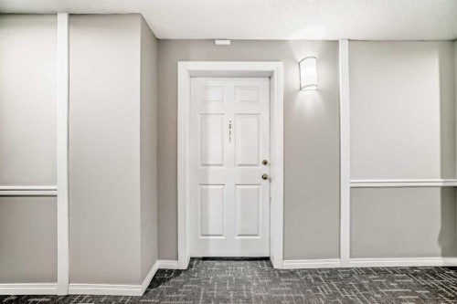 311-290 Shawville Way Se, Calgary, AB - Indoor Photo Showing Other Room