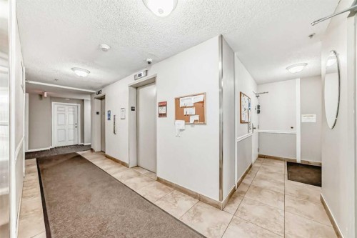 311-290 Shawville Way Se, Calgary, AB - Indoor Photo Showing Other Room